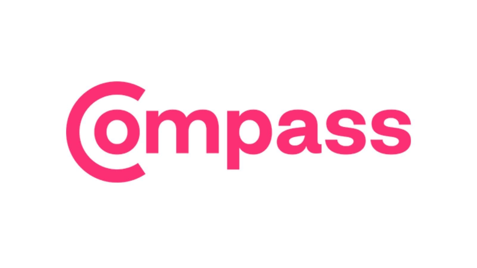 The work Compass in pink writing. The "C" contains the letter "O".