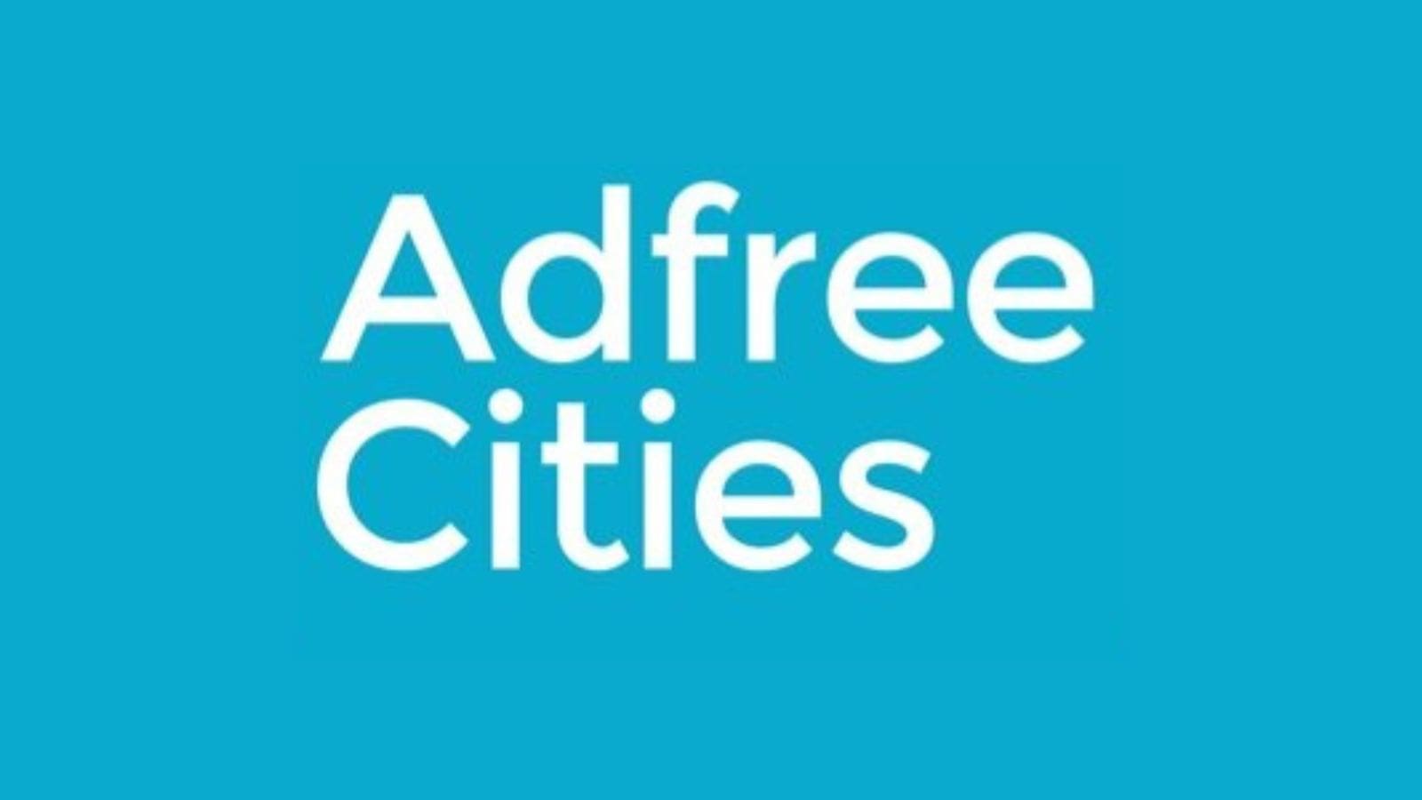 The words "Adfree Cities" on a turquoise background.